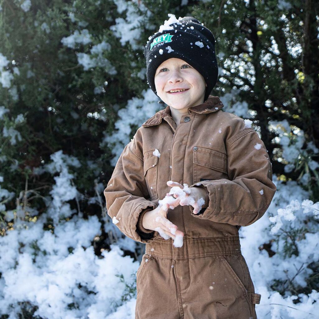 child in key coveralls