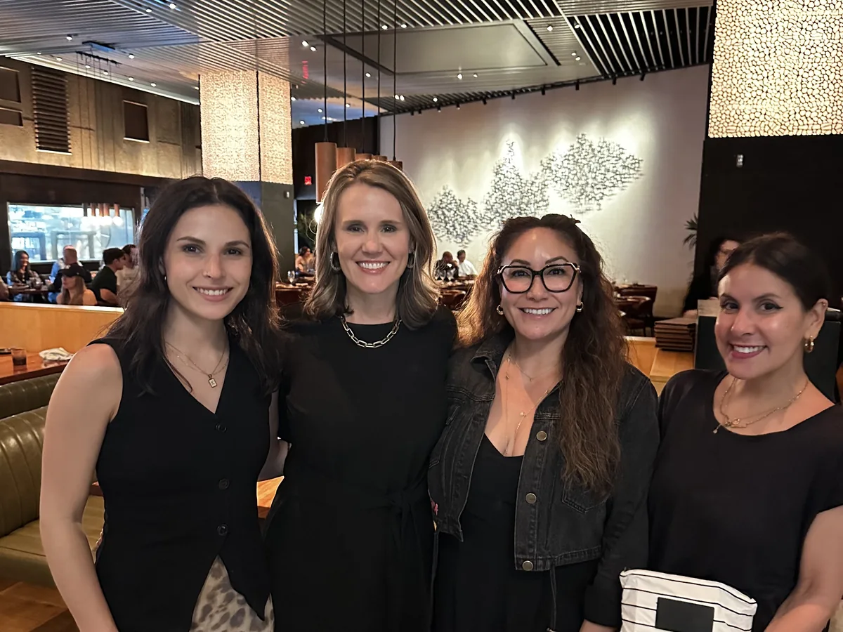 Four guests together at a LimeLight Women in Ecommerce dinner